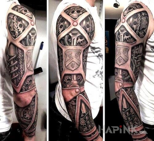 Tattoo Steampunk'owe cudeńko in steampunk motif on the upper arm