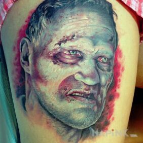 Tattoo Zombies from the walking dead on the leg motif: faces