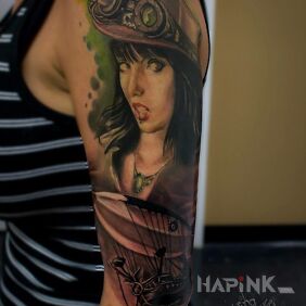 Tattoo A girl from another dimension on the upper arm motif: steampunk
