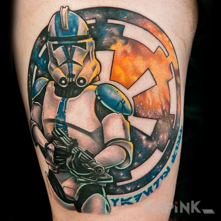 Tattoo Komandos Imperium in characters motif on the leg