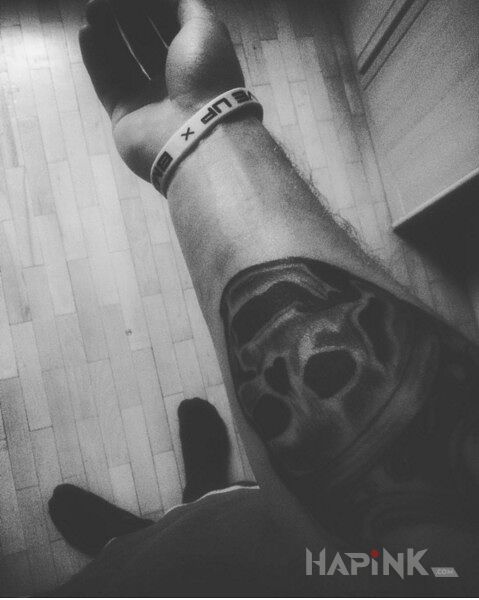 Tattoo Crown Me in skulls motif on the forearm