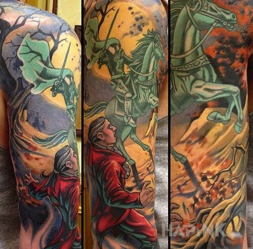 Tattoo Jeździec bez głowy in characters motif on the upper arm
