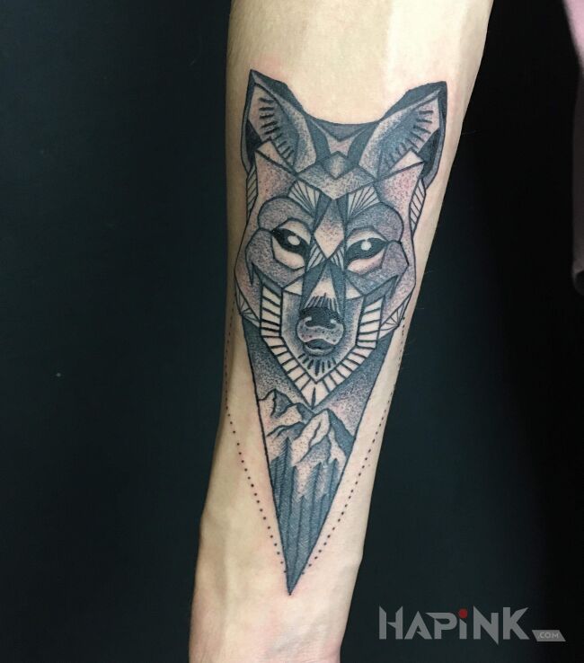 Tattoo Wolf in animals motif on the forearm