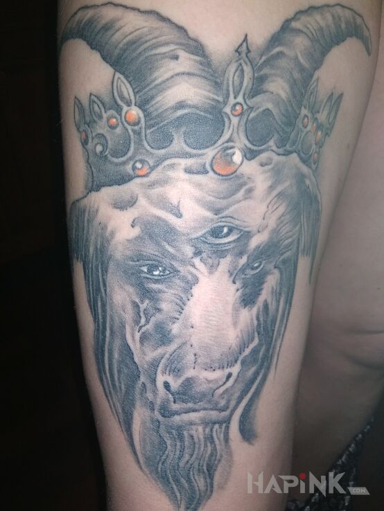 Tattoo Capricorn in zodiac signs motif on the leg