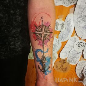 Tattoo Wind rose on the forearm motif: objects