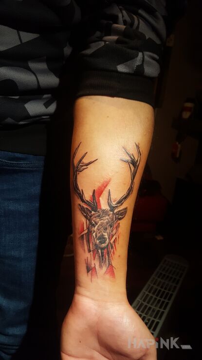 Tattoo Jelonek ;) in animals motif on the forearm