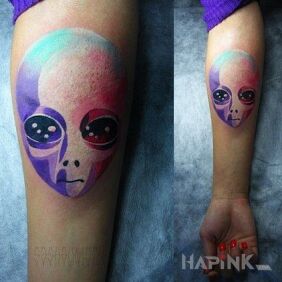 Tattoo The head of a ufuddha on the forearm motif: characters