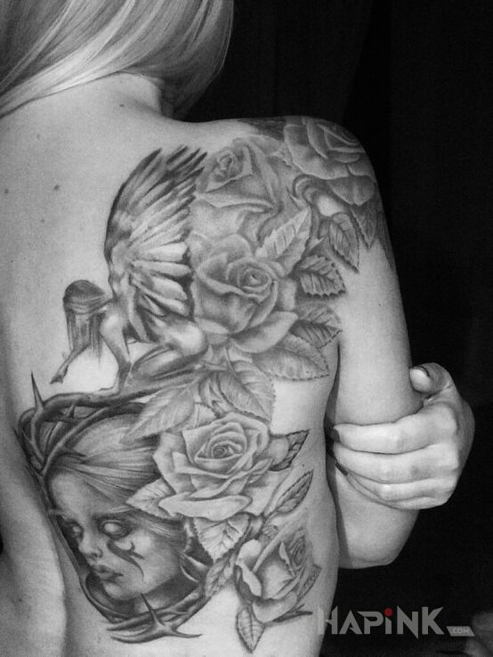 Tattoo Róże, anioł, elfica, cierń in angels motif on the back