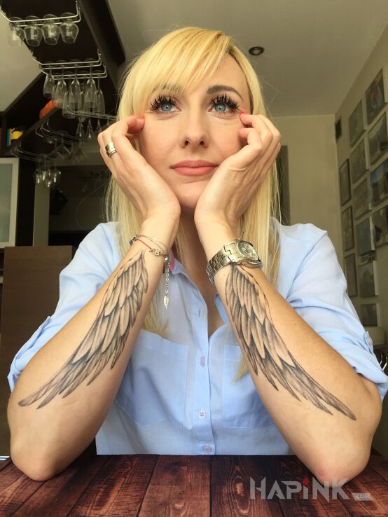 Tattoo Skrzydła in angels motif on the forearm