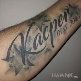 Tattoo Kacper on the wrist motif: lettering