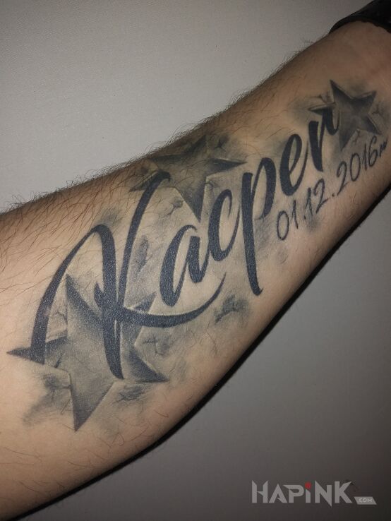 Tattoo Kacper in lettering motif on the wrist
