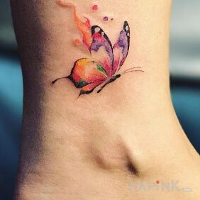 Tattoo Colorful butterfly on the leg motif: butterflies