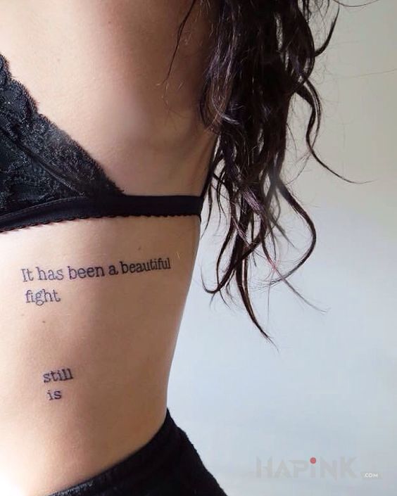 Tattoo Piękna walka in lettering motif on the ribs