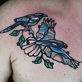 Tattoo Two birds on the chest motif: animals