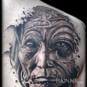 Tattoo Old figure on the shoulder blades motif: faces