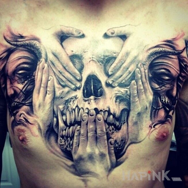 Tattoo Czaszka in skulls motif on the chest