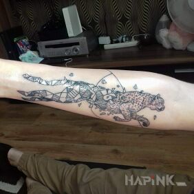 Tattoo Geometric leopard on the forearm motif: animals style: geometric