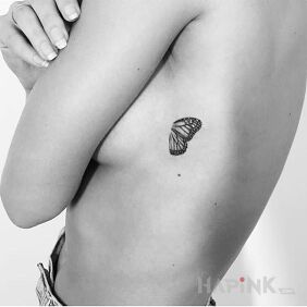 Tattoo Half a butterfly on the ribs motif: butterflies