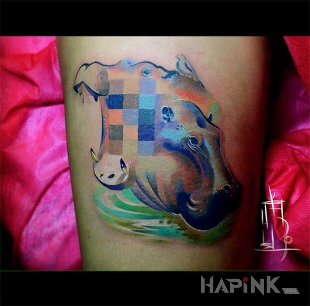 Tattoo Hipopotam in animals motif on the forearm