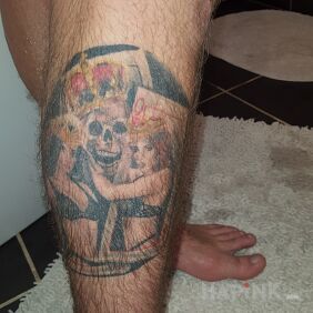 Tattoo Skulls on the calf motif: colorful