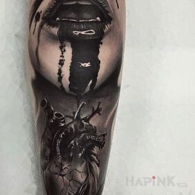 Tattoo Bloody heart on the forearm motif: anatomical style: realistic