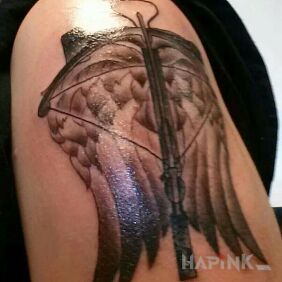 Tattoo Crossbow on the upper arm motif: other
