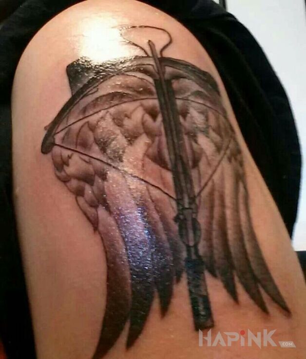 Tattoo Kusza in other motif on the upper arm