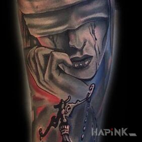 Tattoo Temida on the forearm motif: colorful