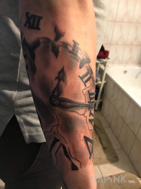 Tattoo Zegar! in other motif on the forearm