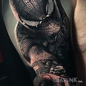 Tattoo Black Spider-Man on the upper arm motif: characters style: realistic