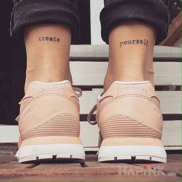 Tattoo Kreuj siebie in lettering motif on the leg