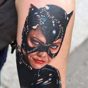 Tattoo Female Cat on the forearm motif: characters