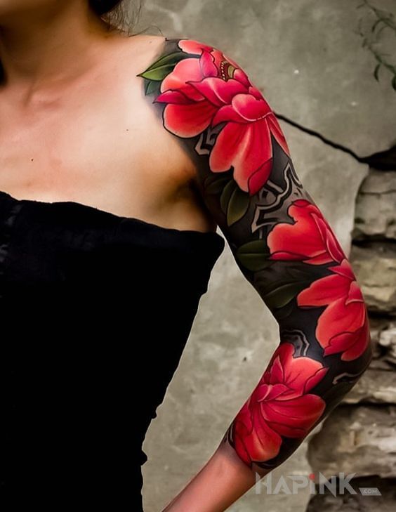 Tattoo Kwiaty w kolorze czerwieni in sleeves motif on the upper arm