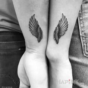 Tattoo Wings on the wrist motif: Love