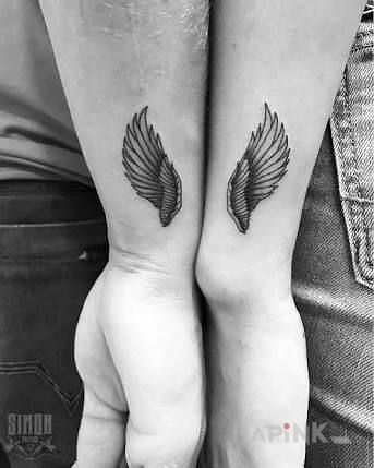 Tattoo Skrzydła in Love motif on the wrist