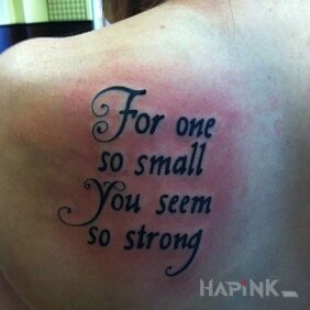 Tattoo Caption on the shoulder blades motif: lettering