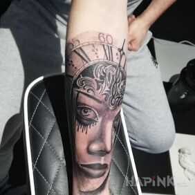 Tattoo Nice on the forearm motif: faces style: realistic