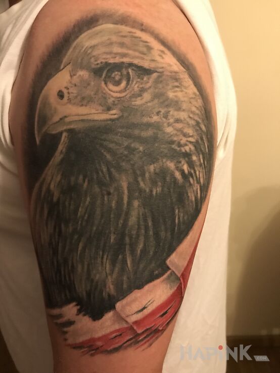 Tattoo Orzeł in patriotic motif and realistic style on the upper arm
