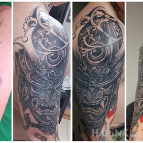 Tattoo Samurai on the upper arm motif: black and gray style: realistic