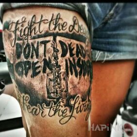 Tattoo Theme from The Walking Dead series on the leg motif: lettering