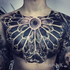 Tattoo Behind the stained glass window on the chest motif: black and gray style: realistic