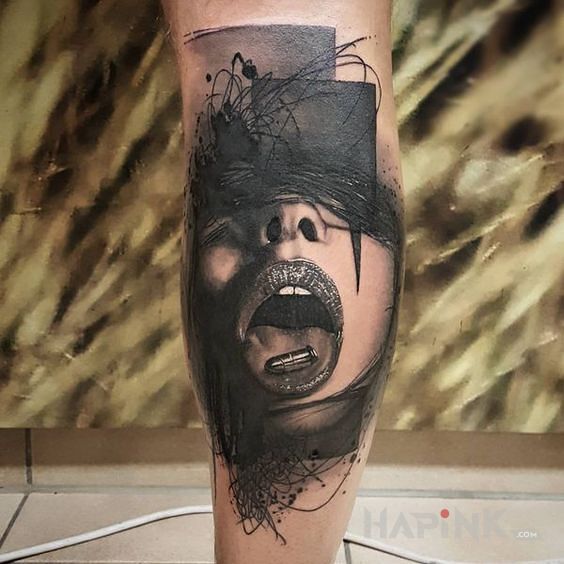 Tattoo Nabój in faces motif and realistic style on the calf