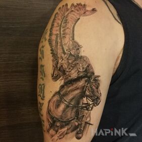 Tattoo Hussars on the upper arm motif: animals style: realistic