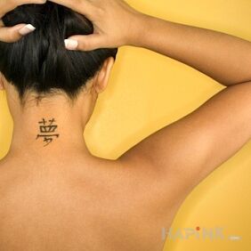Tattoo Chinese sign on the nape motif: lettering