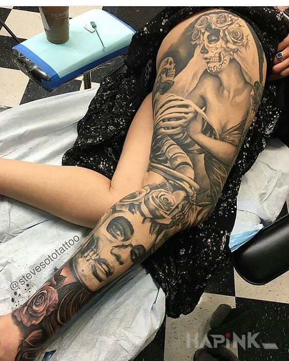 Tattoo Umarłe kobiety in santa muerte motif and realistic style on the leg