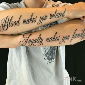 Tattoo Loyalty on the forearm motif: lettering style: calligraphy