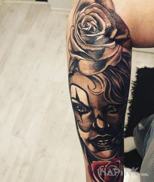 Tattoo Maska smierci w Meksyku in faces motif and chicano style on the forearm