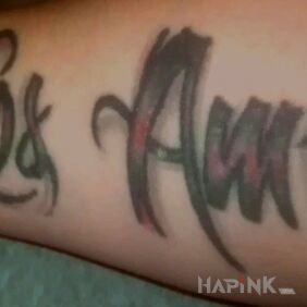 Tattoo I will die laughing on the forearm motif: lettering