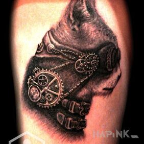 Tattoo Steampunk and the cat on the forearm motif: steampunk