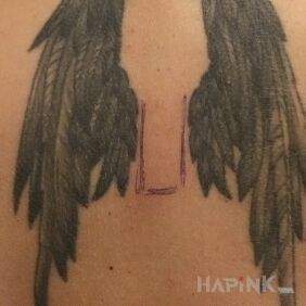 Tattoo A drama from 10 years ago ;)))) on the back motif: black and gray style: graphic / illustrative